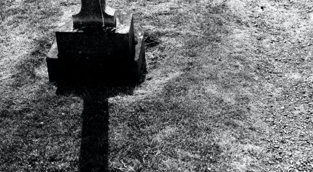 grayscale photography of gray tombstone
