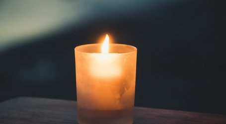 tea light on brown surface