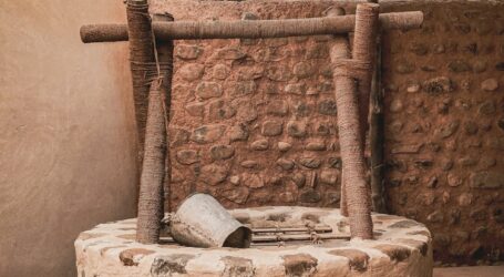 a stone structure with a roof